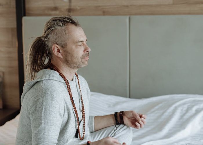 Man in a calm environment demonstrating focus and inner peace.
